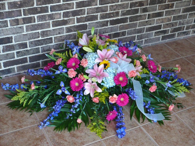Watercolor Lily Full Casket Spray (shown at $300.00)